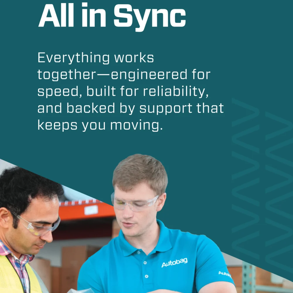 Autobag Team Demonstrating Product Packaging in Warehouse